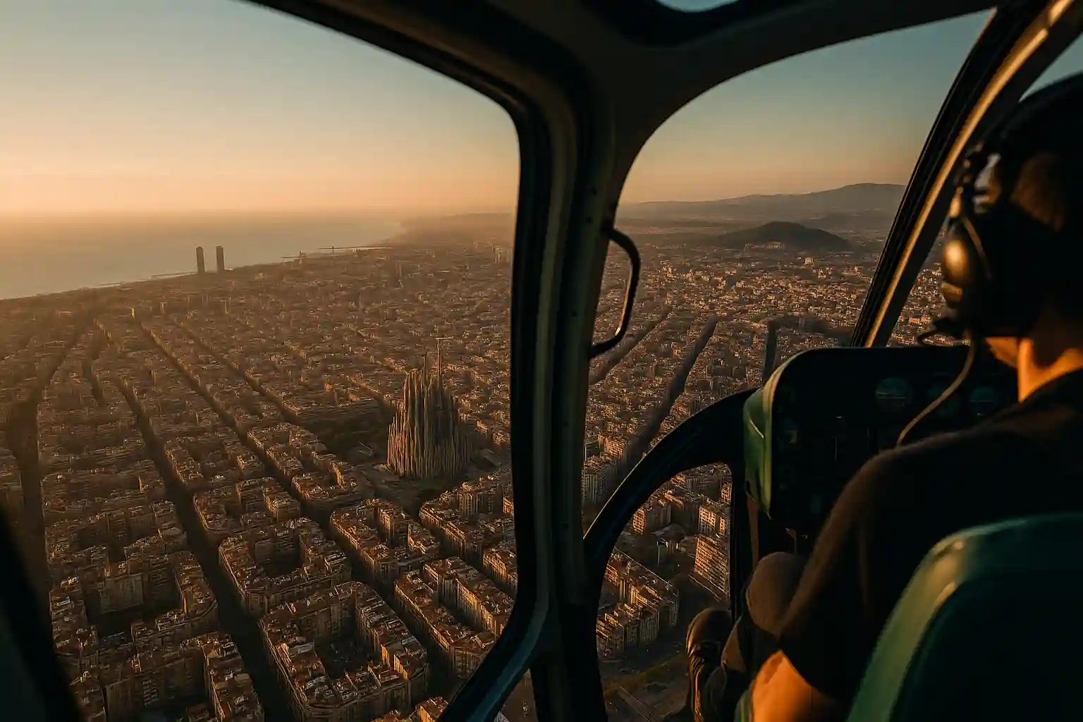 Helicopter view over Barcelona coastline and Sagrada Família