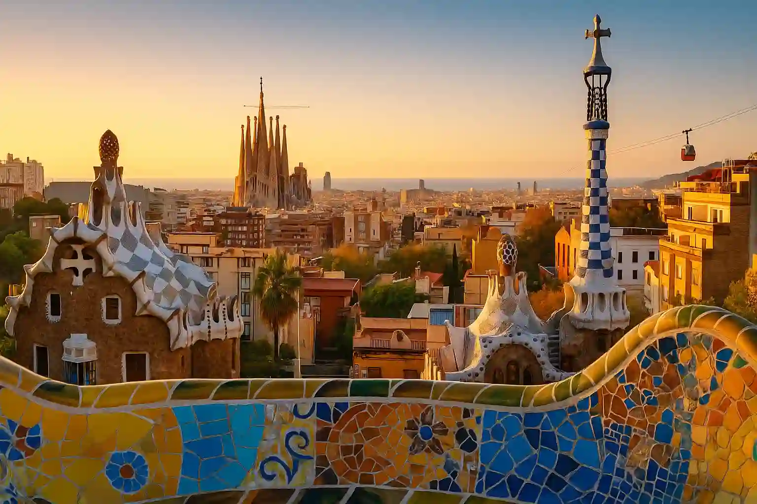 Barcelona skyline with Park Güell mosaics in the foreground and Sagrada Família on the horizon
