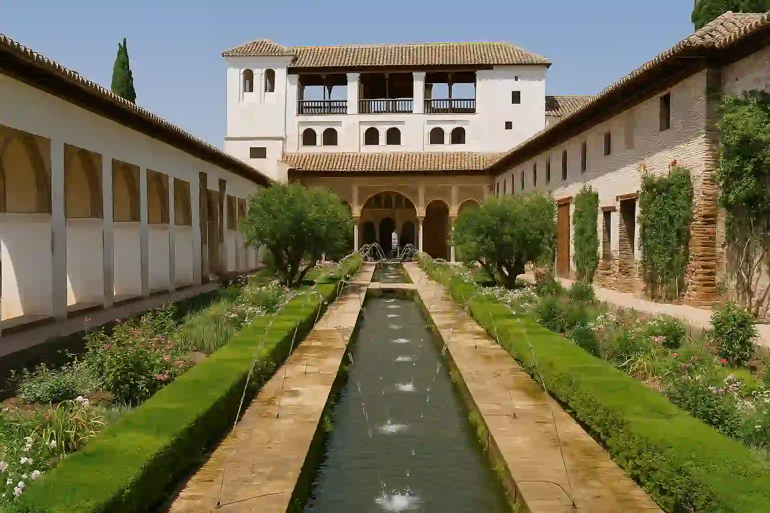 Generalife gardens with water channels and cypress hedges