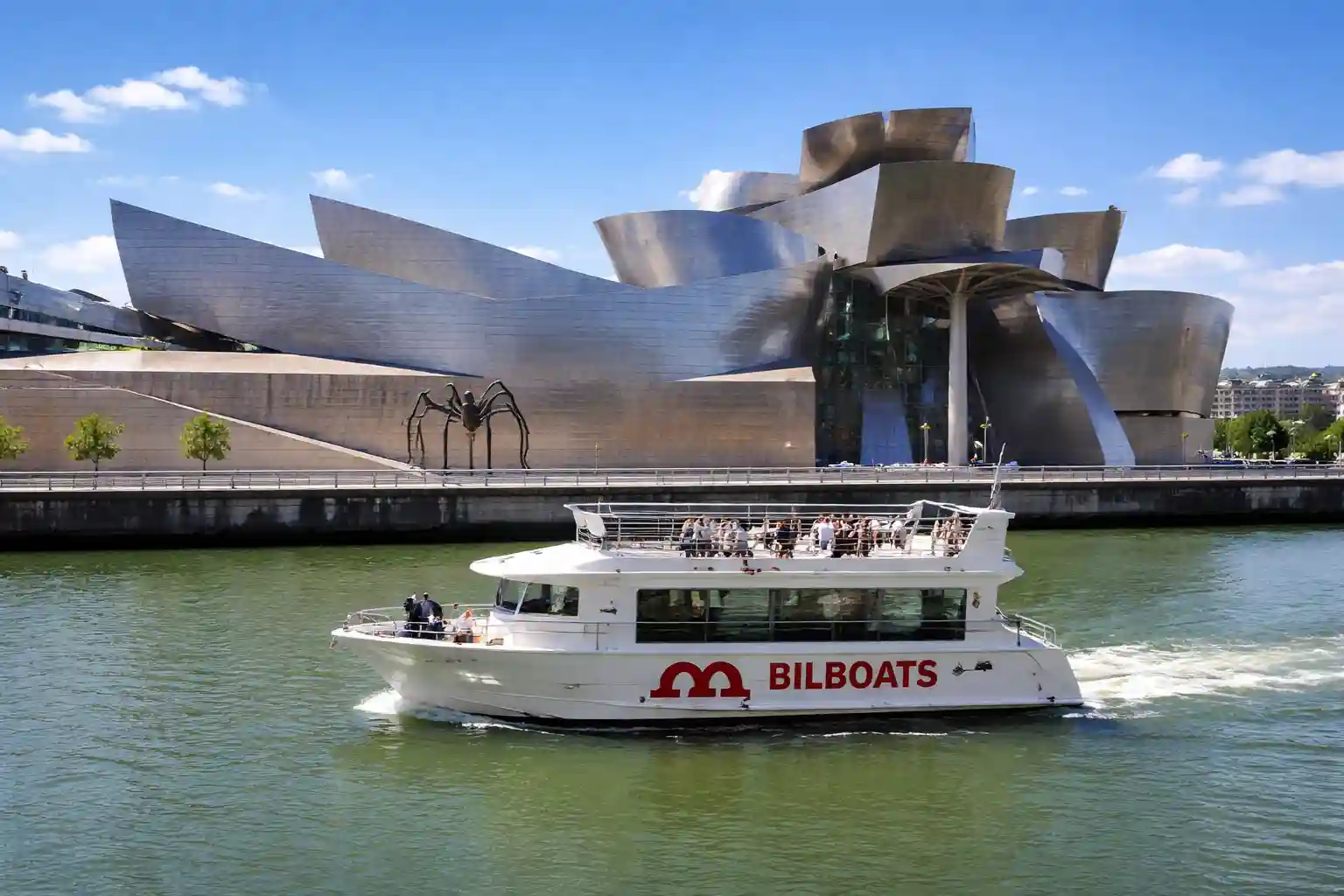 Bilbao boat tour — Nervión river cruise past the Guggenheim Museum and Zubizuri bridge