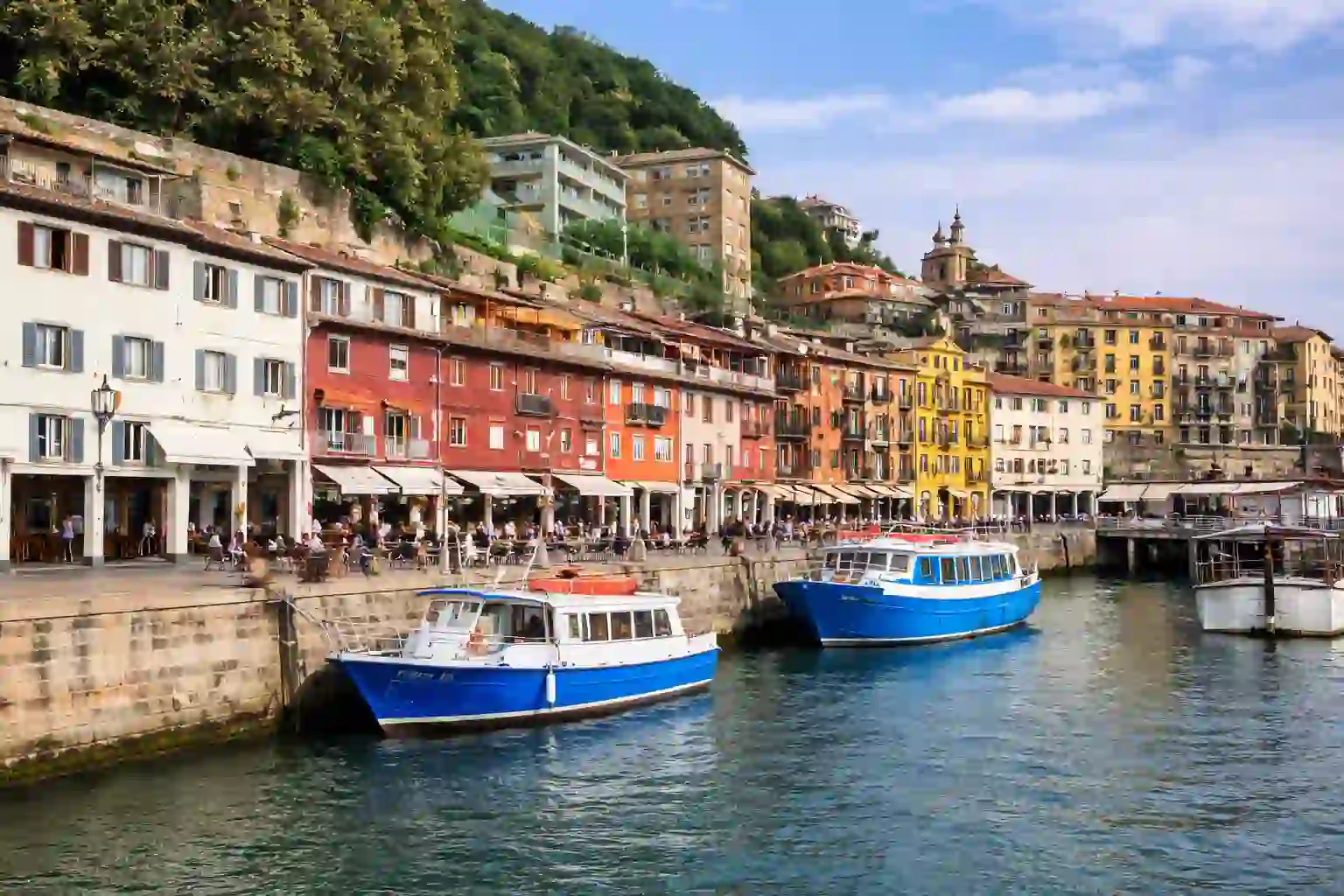 Boat crossing La Concha Bay toward Santa Clara Island, San Sebastián